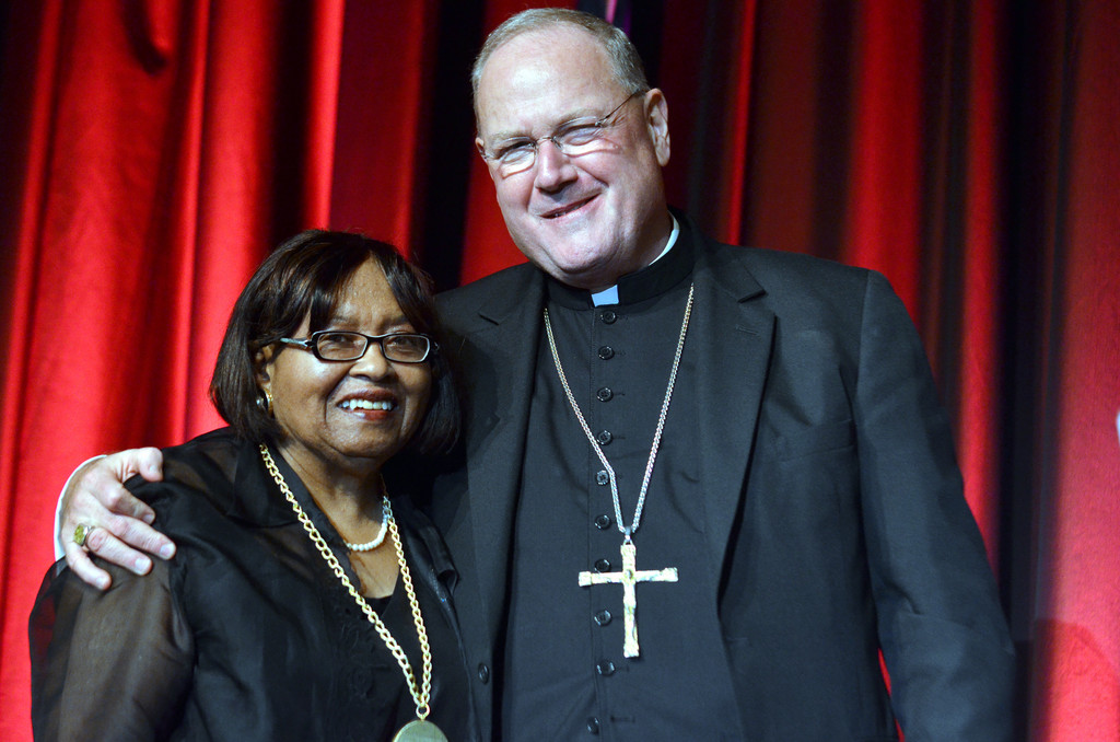Archbishop Dolan stands with honoree Dr. Beverly A. Carroll at the Sept. 20 Pierre Toussaint scholarship and awards dinner.
