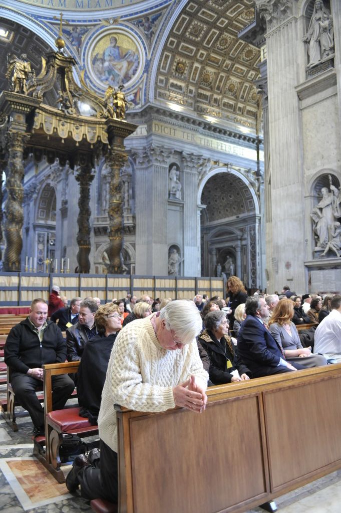 Cardinal Egan celebrates Mass for pilgrims in St Peter's Basilica.