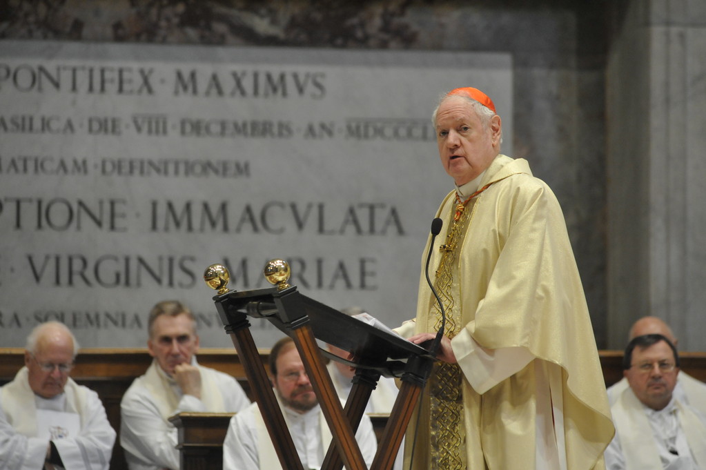 Cardinal Egan celebrates Mass for pilgrims in St Peter's Basilica.