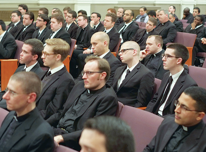 FULL ATTENTION—Seminarians from the Archdiocese of New York and Dioceses of Brooklyn and Rockville Centre, above, listen intently to former U.S. Secretary of State Dr. Henry Kissinger, inset, at St. Joseph’s Seminary, Dunwoodie, April 9. Dr. Kissinger answered questions the seminarians submitted in advance.