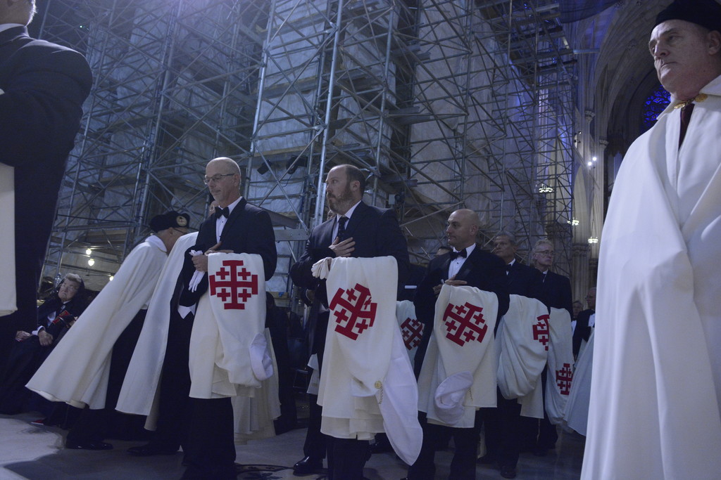 knights carrying robes bearing the distinctive Jerusalemite Cross process into St. Patrick’s Cathedral Sept. 27 during the investiture ceremony for the Equestrian Order of the Holy Sepulchre of Jerusalem’s Eastern Lieutenancy of the United States.