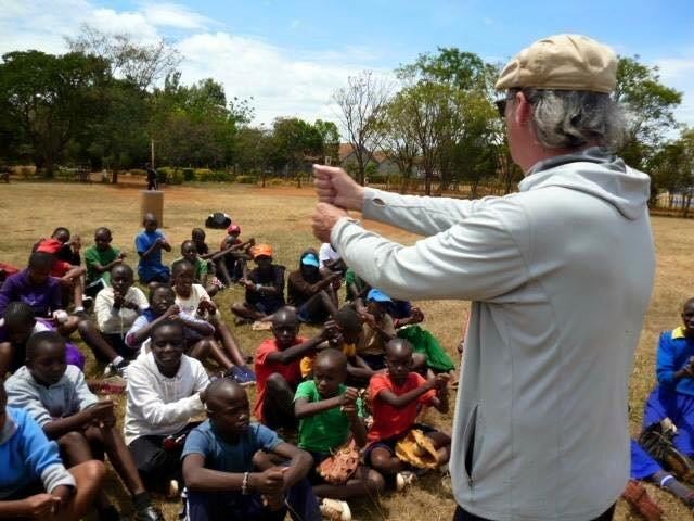 Baseball Miracles founder and director John Tumminia, a parishioner of St. Mary’s in Marlboro, instructs ballplayers in Kenya last October.