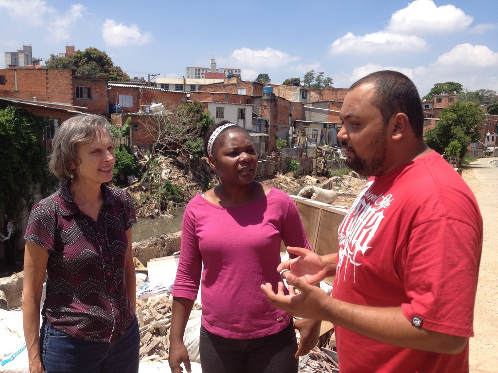 FIELD WORK—Joanne Blaney, left, confers with Maryknoll Sister Armeline Sidoine, a novice, and co-worker Jose Silva in Brazil. Ms. Blaney, who served nearly 20 years as a lay missioner in the South American country, is now mission services director for the Maryknoll Lay Missioners.