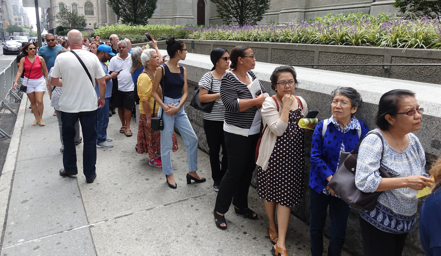 Devotees of St. Padre Pio wait to file into St. Patrick’s Cathedral from 51st Street Sept. 17 to venerate relics of the Italian-born saint on display in the Lady Chapel. The line extended around the corner to Madison Avenue, in front of the cathedral’s Parish House.