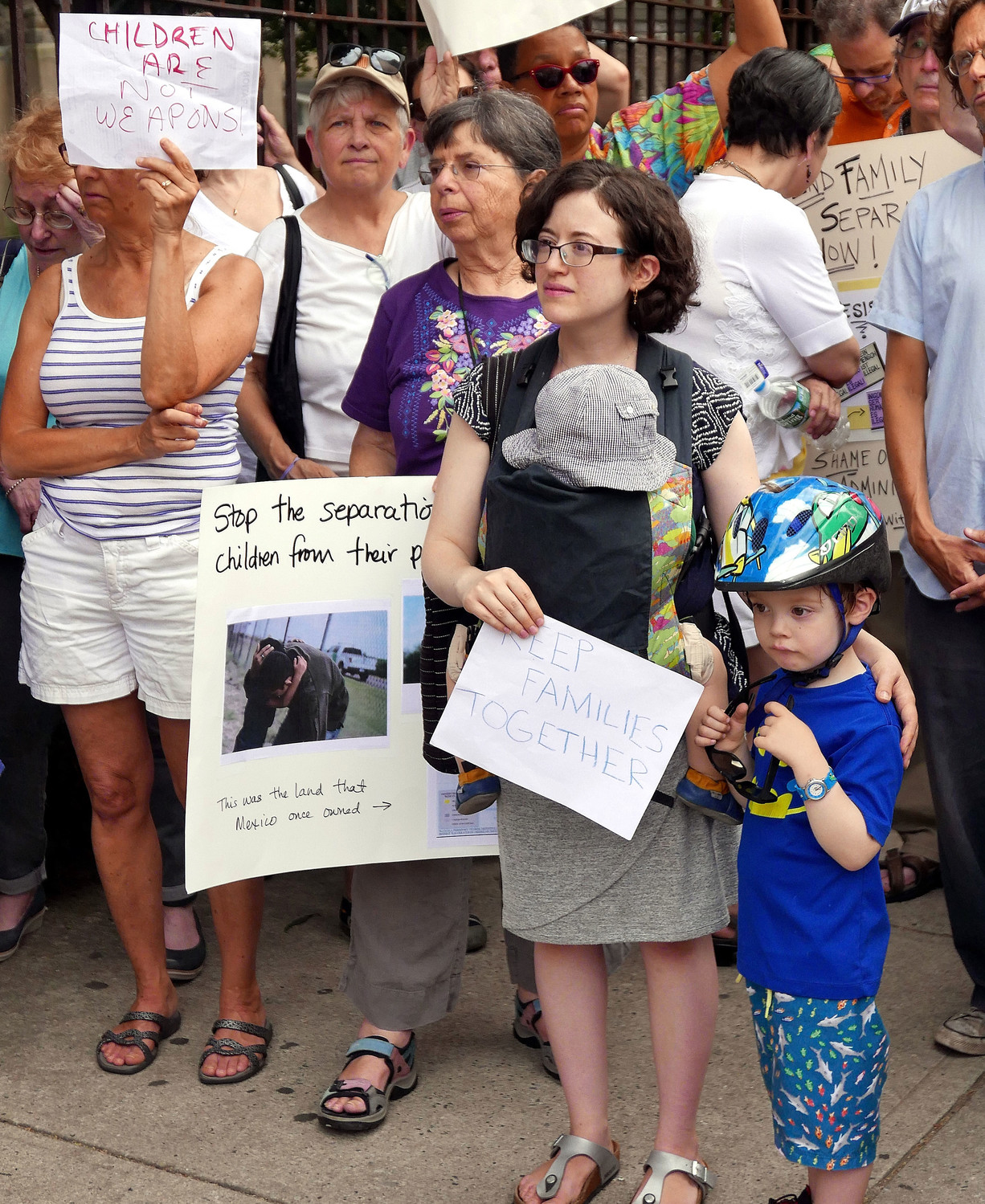 Arielle Rubenstern and her children, Raphael, 4, and Elijah, 1, participated in a vigil in the Bronx June 18 calling for an end to the separation of children from their parents at the U.S. border with Mexico. The event was co-sponsored by the Sisters of Charity of New York and North Bronx Racial Justice. “As women religious, as Christians, it is our moral duty to speak for the children who are being separated from their parents. This policy is devastating and dangerous on countless levels and it must end,” said Sister Jane Iannucelli, S.C., president of the Sisters of Charity.
