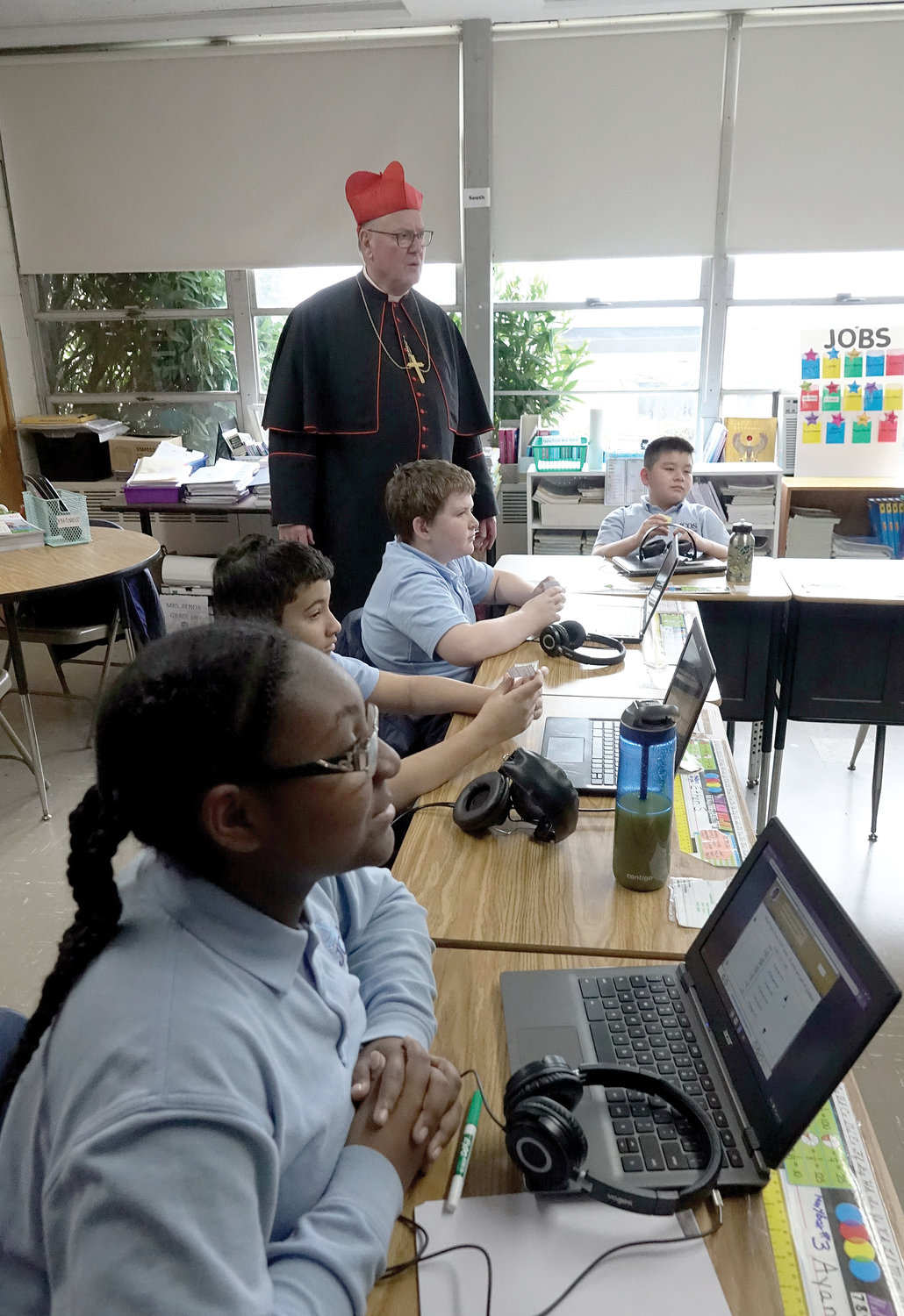 Cardinal Dolan tours the computer class at the John Cardinal O’Connor School in Irvington Jan. 27, the second day of National Catholic Schools Week.