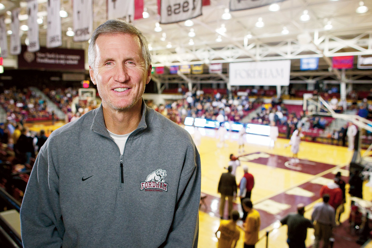 CALL TO HALL—Mike Breen, a 2020 winner of the Curt Gowdy Media Award for the Naismith Memorial Basketball Hall of Fame in Springfield, Mass., smiles at Rose Hill Gymnasium during a visit to his alma mater, Fordham University.