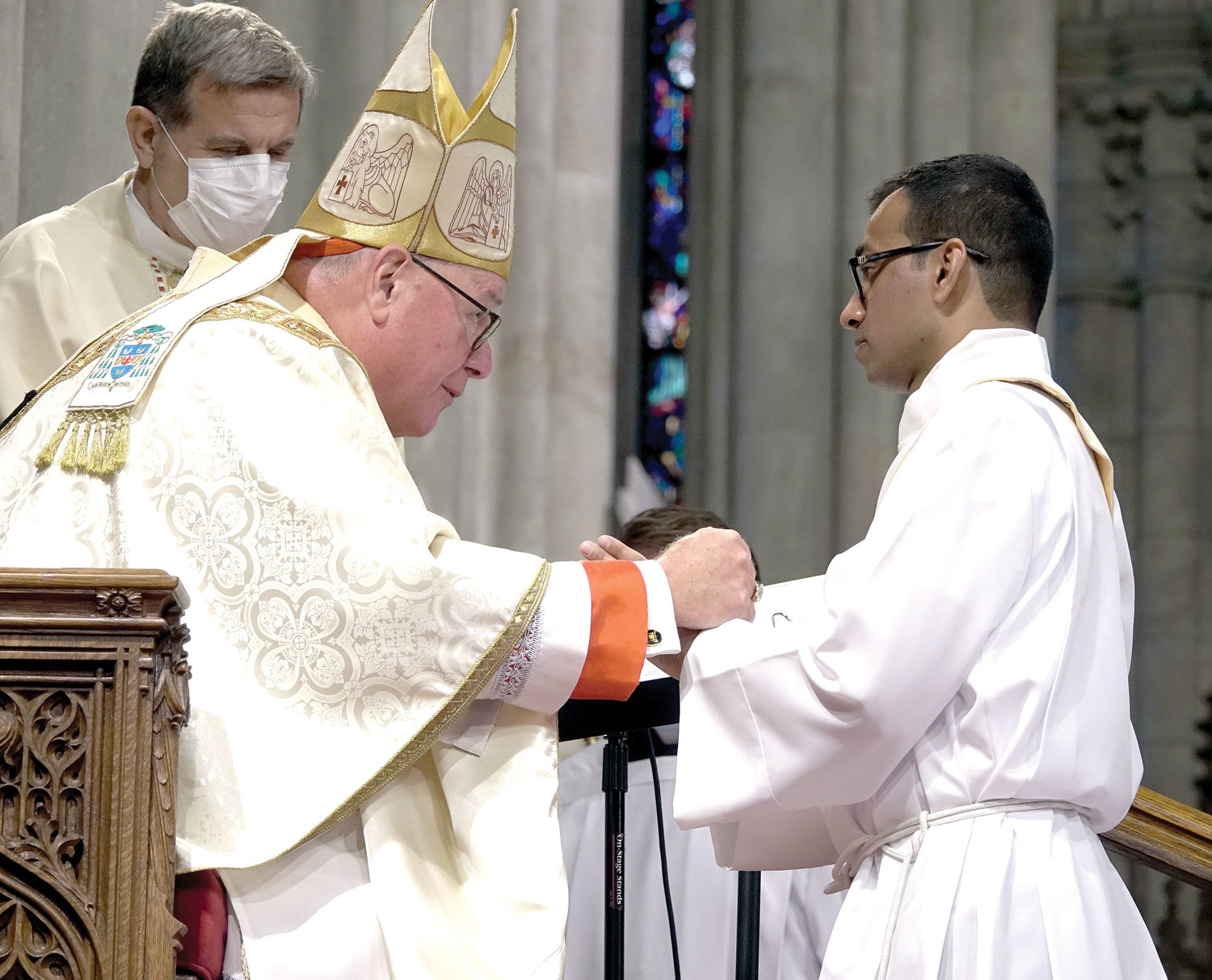 Cardinal Dolan served as principal celebrant at the Mass of Ordination of Priests June 26 at St. Patrick’s Cathedral. One of the new priests is Father Roland P. Pereira, M.Id., born in India and ordained for the Idente Missionaries.