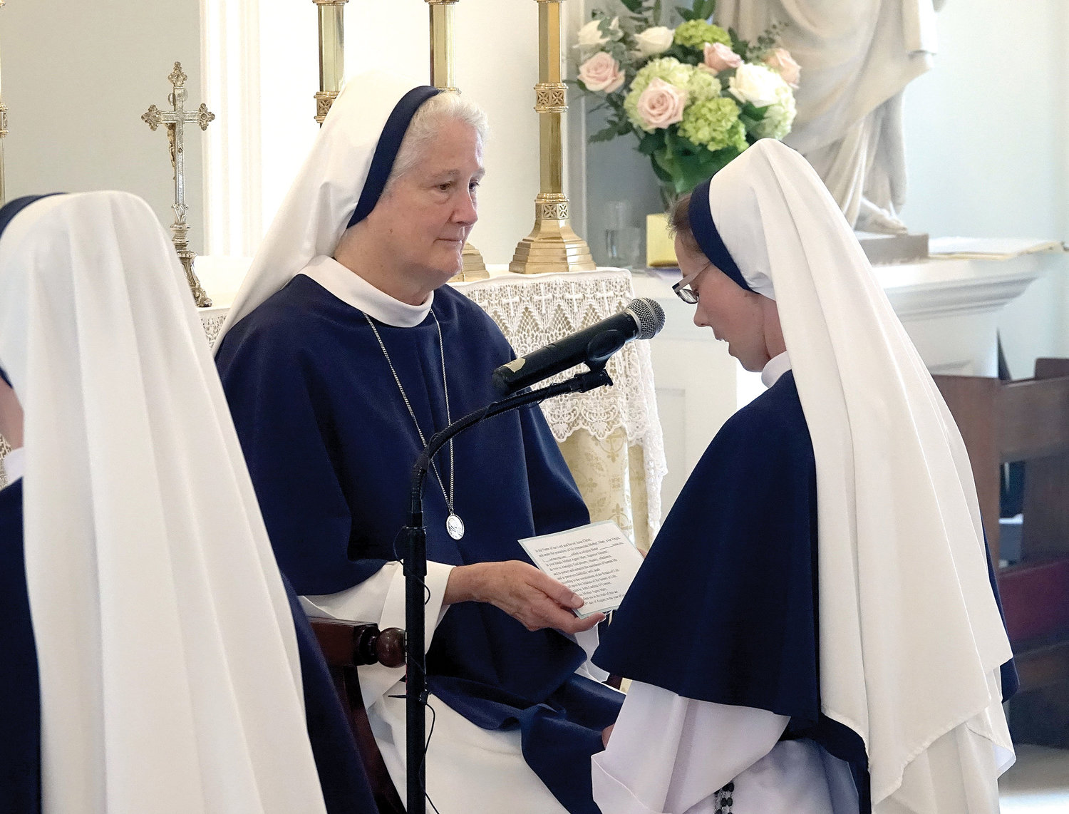 Sister Naomi Maria Magnificat, S.V., professes vows before Mother Agnes Mary Donovan, S.V., superior general of the Sisters of Life.
