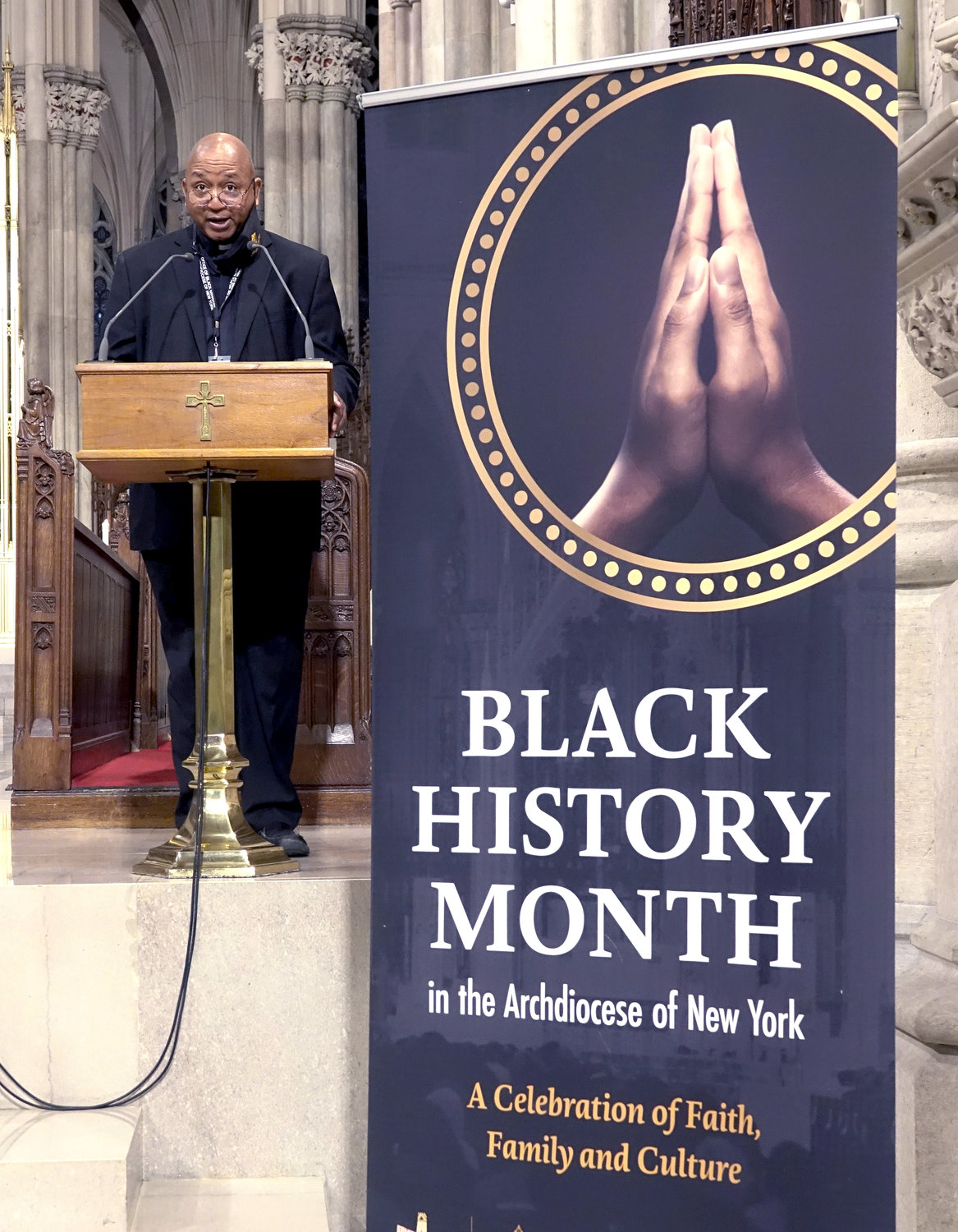 Brother Tyrone A. Davis, C.F.C., executive director of the archdiocesan Office of Black Ministry, speaks Feb. 7 during the annual Black History Month Mass at St. Patrick’s Cathedral. About 275 people attended. Because of pandemic restrictions, organizers had encouraged the faithful to join the Mass virtually via livestream through the cathedral website.
