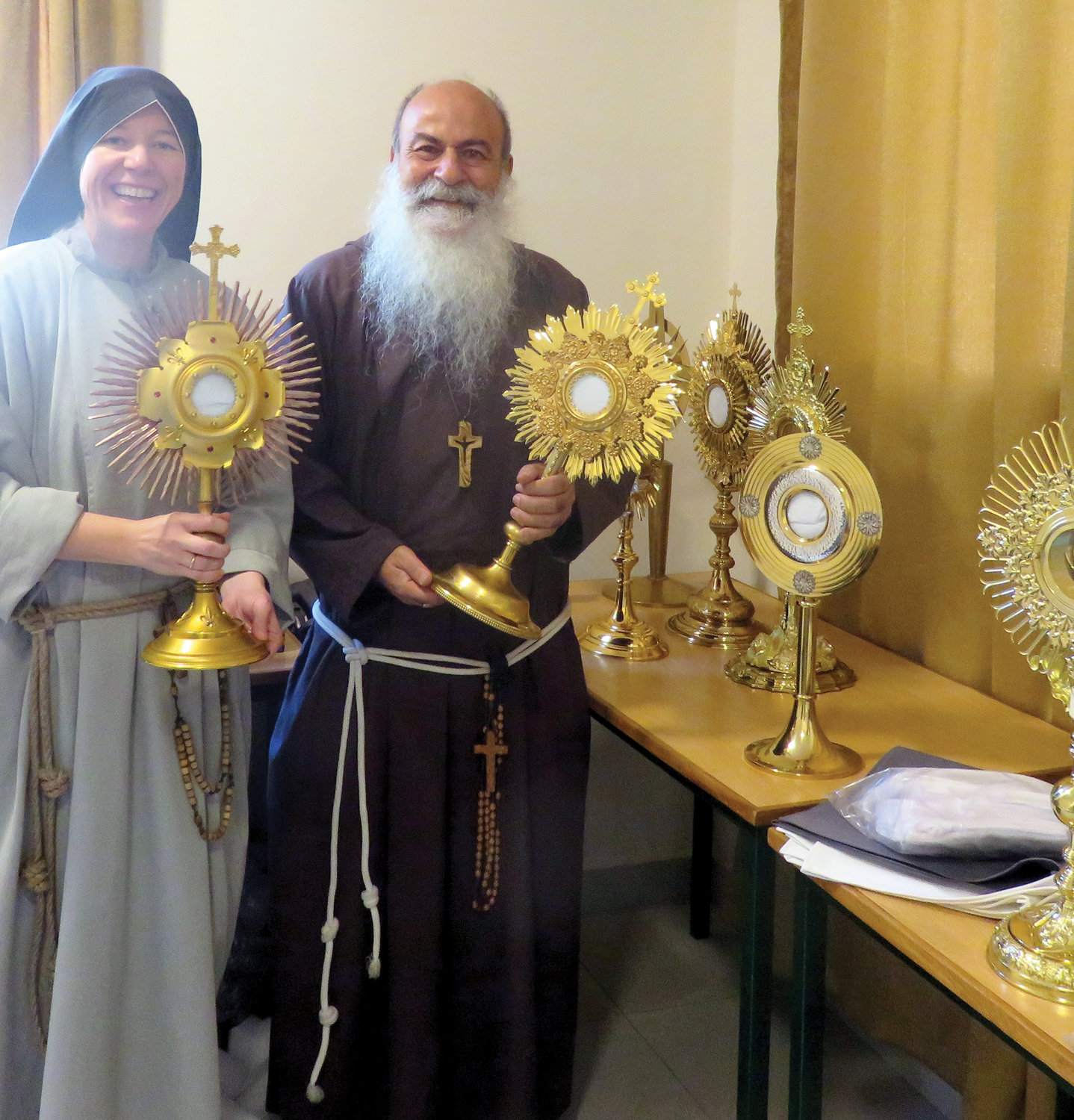 Mother Clare Matthias, C.F.R., community servant (superior general) of the Franciscan Sisters of the Renewal, and Bishop Angelo Pagano, O.F.M. Cap., Vicar Apostolic of Harar, hold monstrances delivered from New York to the Apostolic Vicariate of Harar in Ethiopia.