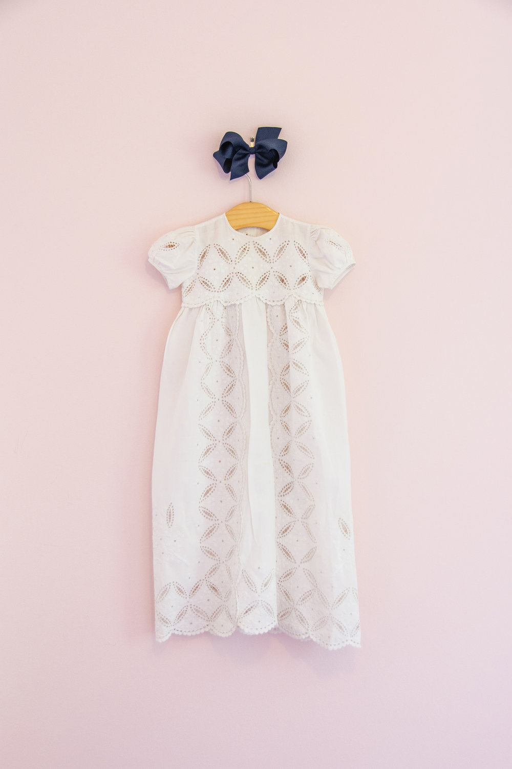 FAMILY TREASURE—The fabric of this christening gown forms a pattern of love knitting together generation after generation of one family.