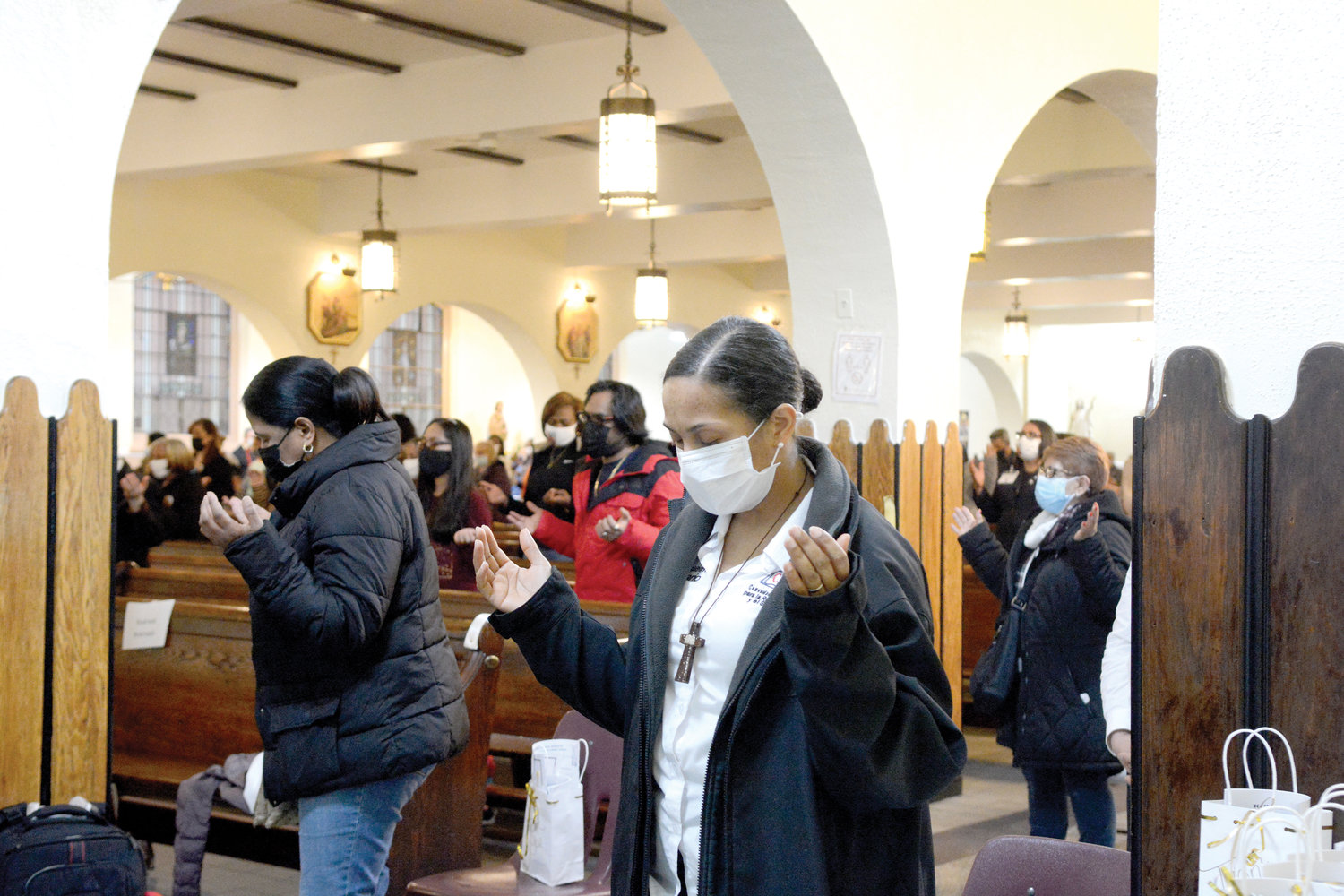 Faithful parishioners pray during the March 20 closing Mass celebrating the 100th anniversary of St. Simon Stock in the Bronx. Auxiliary Bishop Peter Byrne served as principal celebrant and homilist. Founded in 1920, the parish has been administered from the beginning by the Carmelite Friars. The current pastor is Father Michael Kissane, O. Carm.