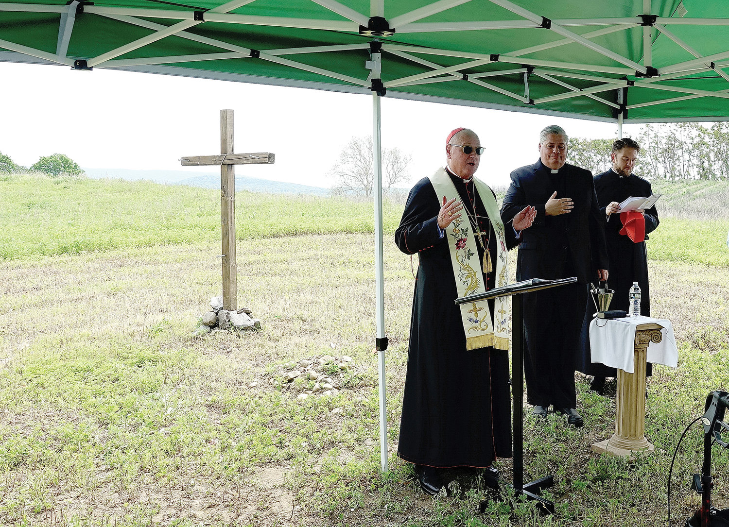 Before the playground was dedicated, the cardinal blessed new land given to the parish cemetery on Route 94 in nearby Blooming Grove for a future mausoleum and columbarium.