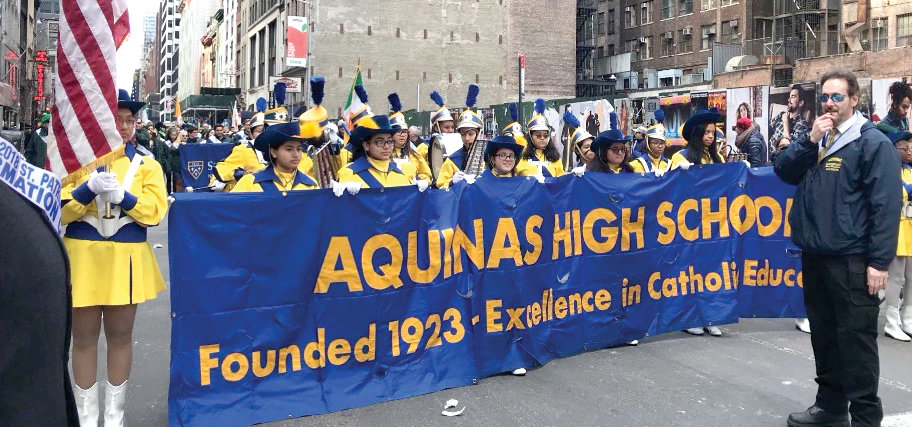 Aquinas High School band is shown at the 2019 St. Patrick’s Day Parade in Manhattan. Aquinas is closing this month after educating young women for 98 years.