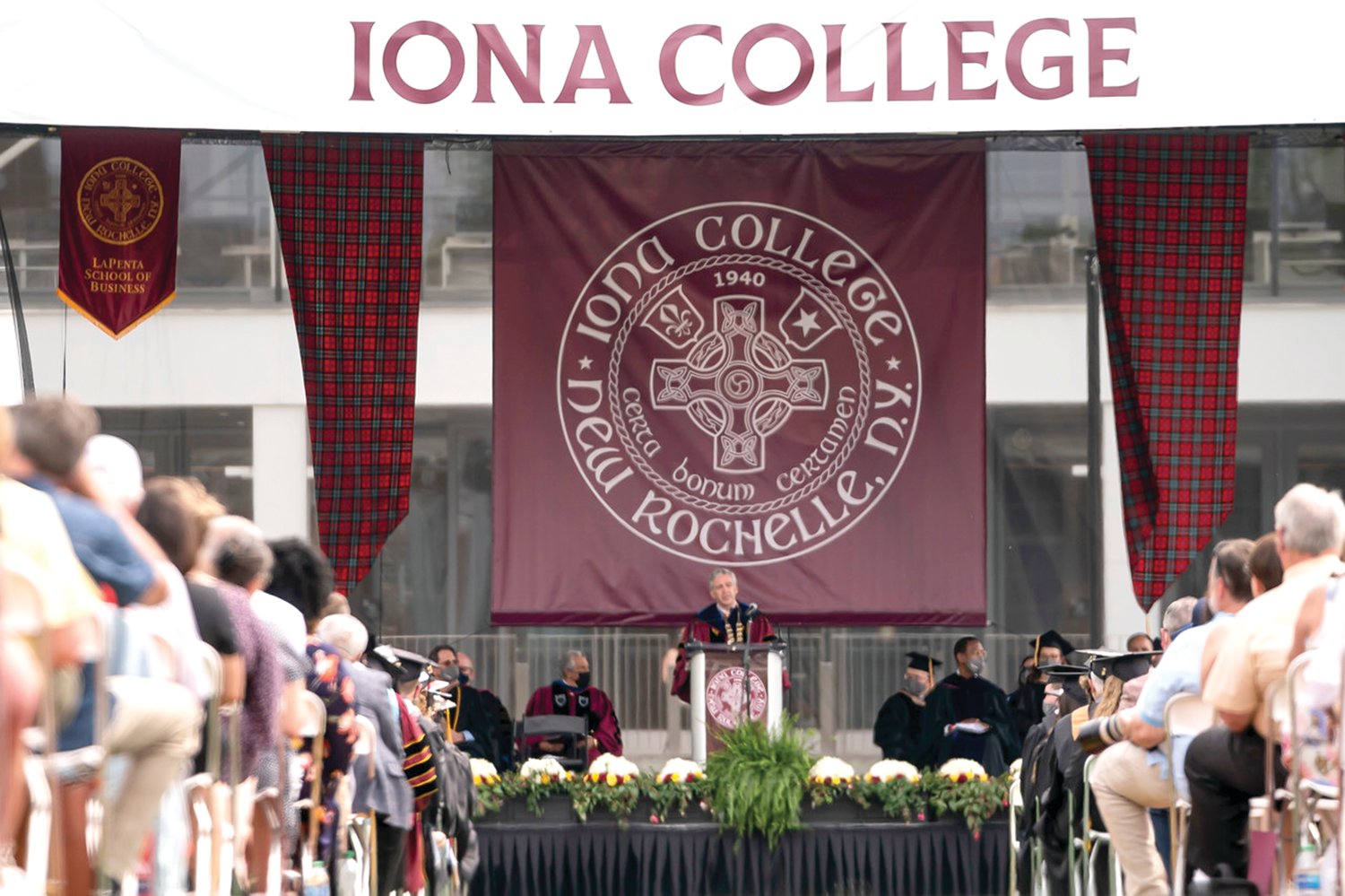 Dr. Seamus Carey, president of Iona College in New Rochelle, speaks at an in-person recognition ceremony May 22.