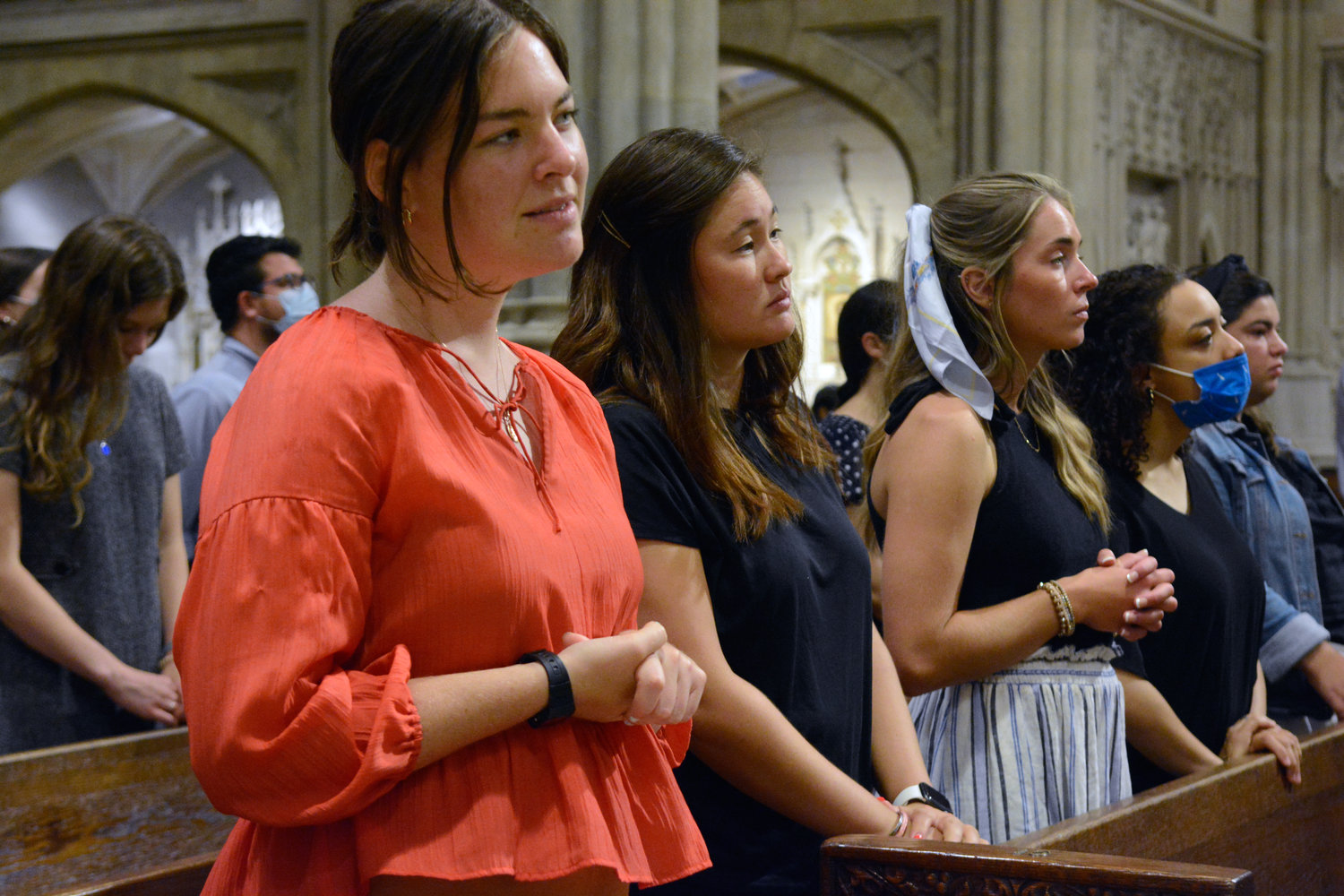 Young adults gather Aug. 4 at St. Patrick’s Cathedral in Manhattan for the monthly Young Adult Mass sponsored by the archdiocesan Office of Young Adult Outreach.