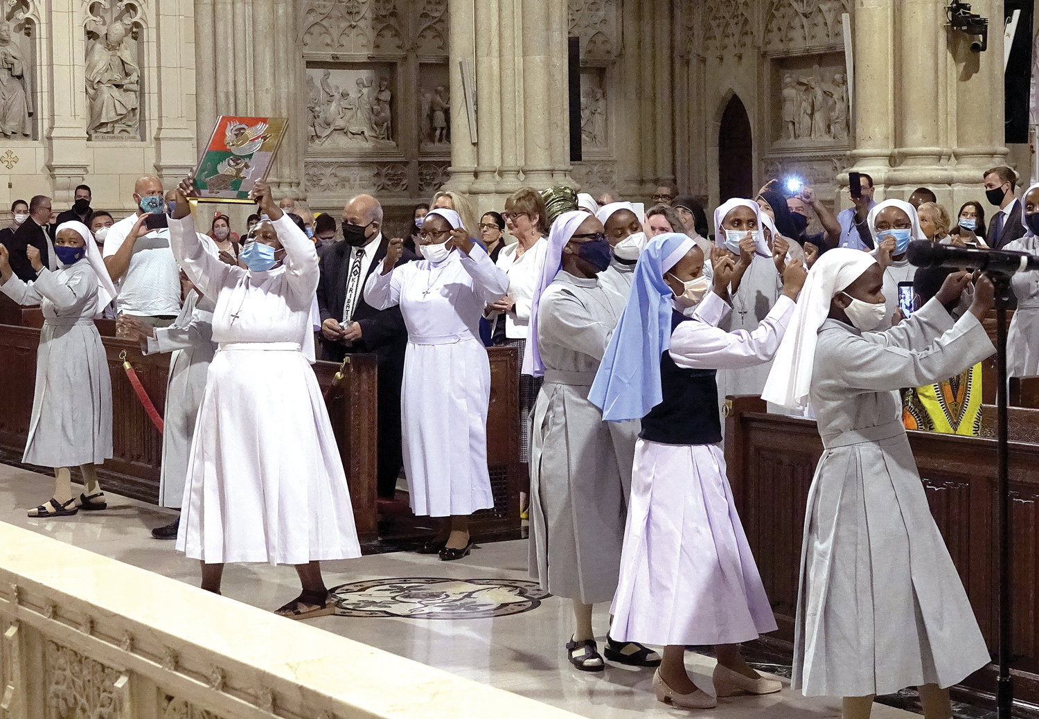 A procession by religious sisters from Kenya preceded the reading of the Gospel by Deacon Martin Asiamah of St. Luke’s parish in the Bronx during the Mass for Persecuted Christians in Africa, which Cardinal Dolan celebrated at St. Patrick’s Cathedral Sept. 9.