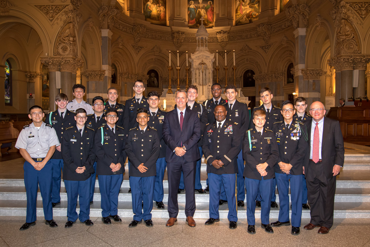 New York City Police Commissioner Dermot Shea, a 1986 alumnus of Xavier High School in Manhattan, is pictured with members of the school’s Army JROTC Regiment Sept. 10 at nearby St. Francis Xavier Church. The commissioner, on behalf of the NYPD, gathered with the school community at a Memorial Mass at the church to remember the 10 alumni and numerous family members and friends lost during the terrorist attacks of 9/11.