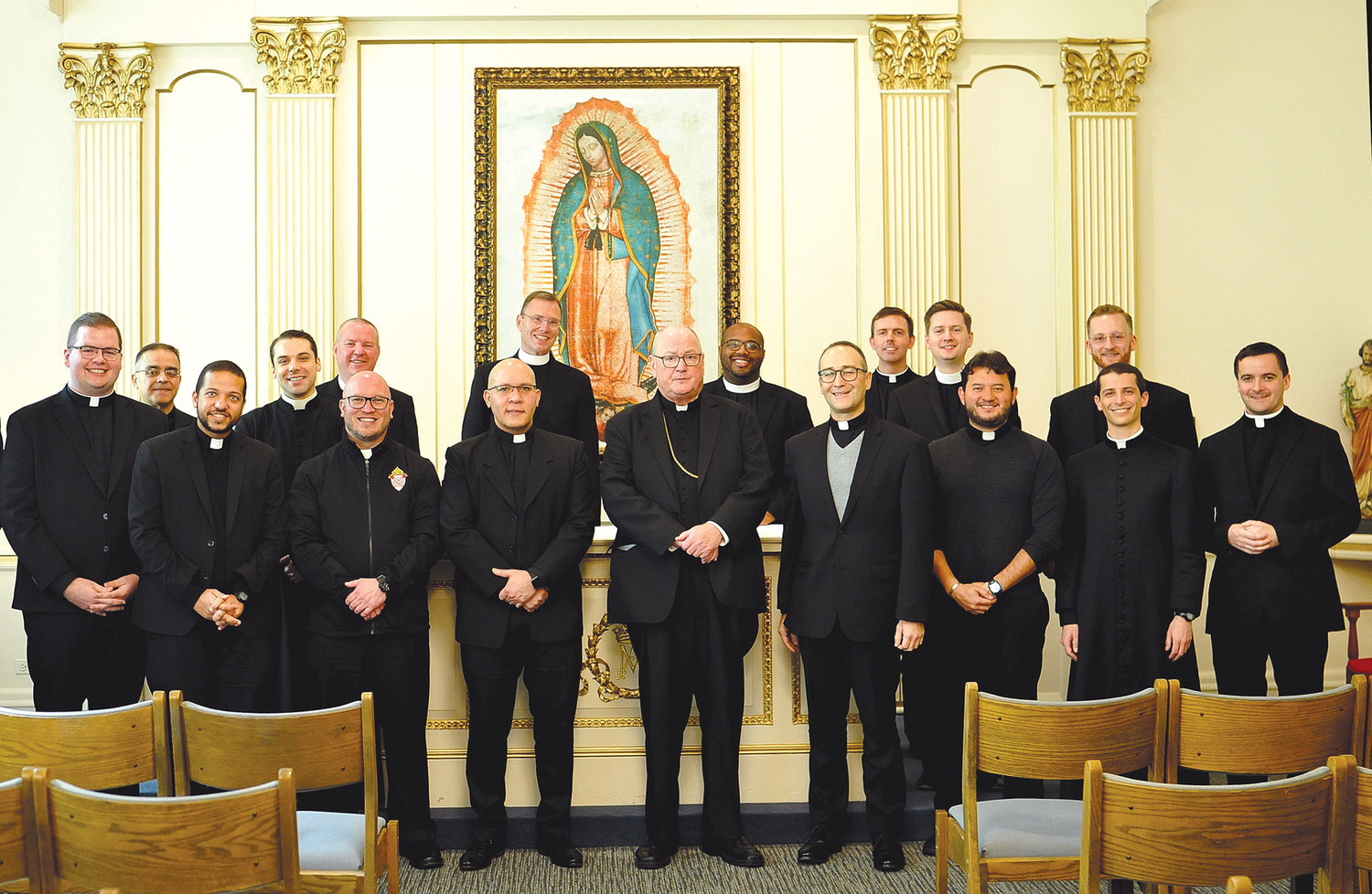 Cardinal Dolan and, to his right, Father George Sears, the new director of vocations for the archdiocese, gather with priests named regional vocation promoters Oct. 28 at St. Joseph’s Seminary in Dunwoodie.