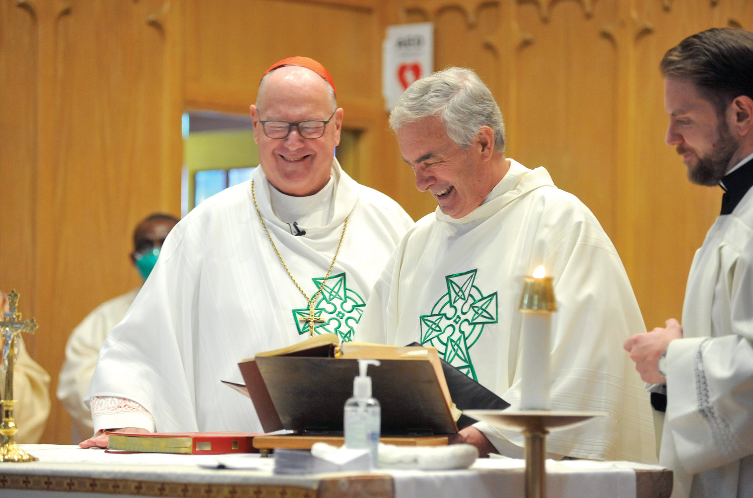 Father Thomas Colucci is installed as pastor of Most Precious Blood parish by Cardinal Dolan at a Mass celebrating the 125th anniversary of the church in Walden Nov. 6.