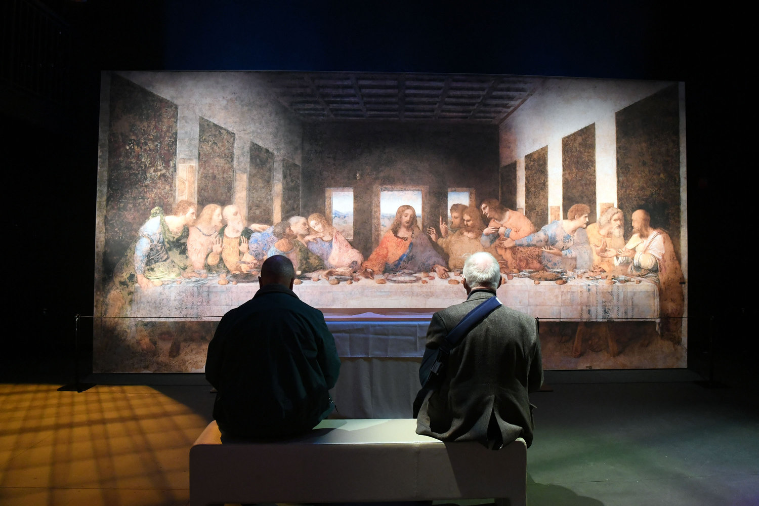 Two visitors take in da Vinci’s Last Supper.