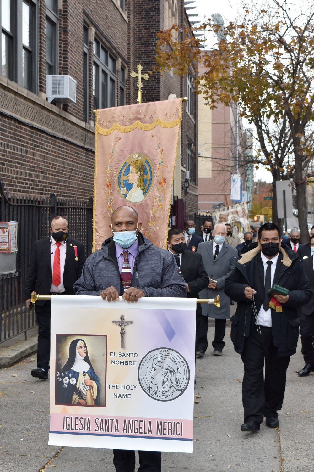A brief procession preceded the Nov. 21 Mass at St. Angela Merici Church in the Bronx for the Feast of Christ the King. It was the third annual Mass sponsored by the Holy Name Society of New York: Hispanic Division.