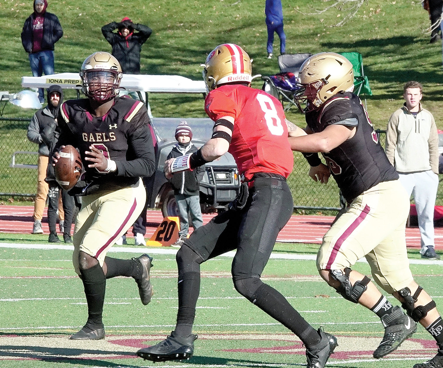 Iona Prep quarterback Ajani Sheppard looks to pass in the game where he became the first player in Westchester County history to surpass 2,000 passing yards and 1,000 rushing yards in a single season.