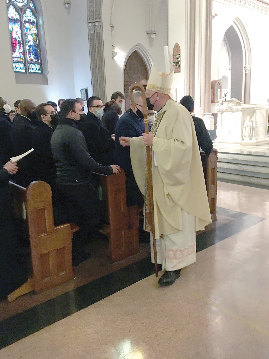 The cardinal greets seminarians from St. Joseph’s Seminary, Dunwoodie, at Mass.