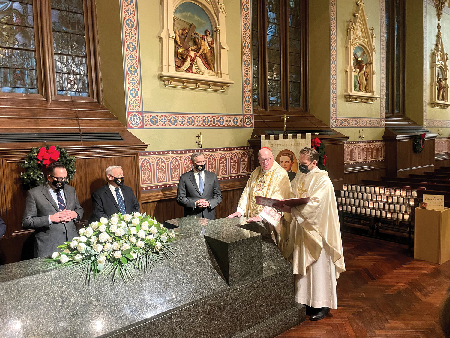 Cardinal Dolan leads those present in the Prayer for Canonization at the tomb of Blessed Michael McGivney. He entrusted to Blessed Michael McGivney’s intercession the intentions of parish priests serving in the Archdiocese of New York.
