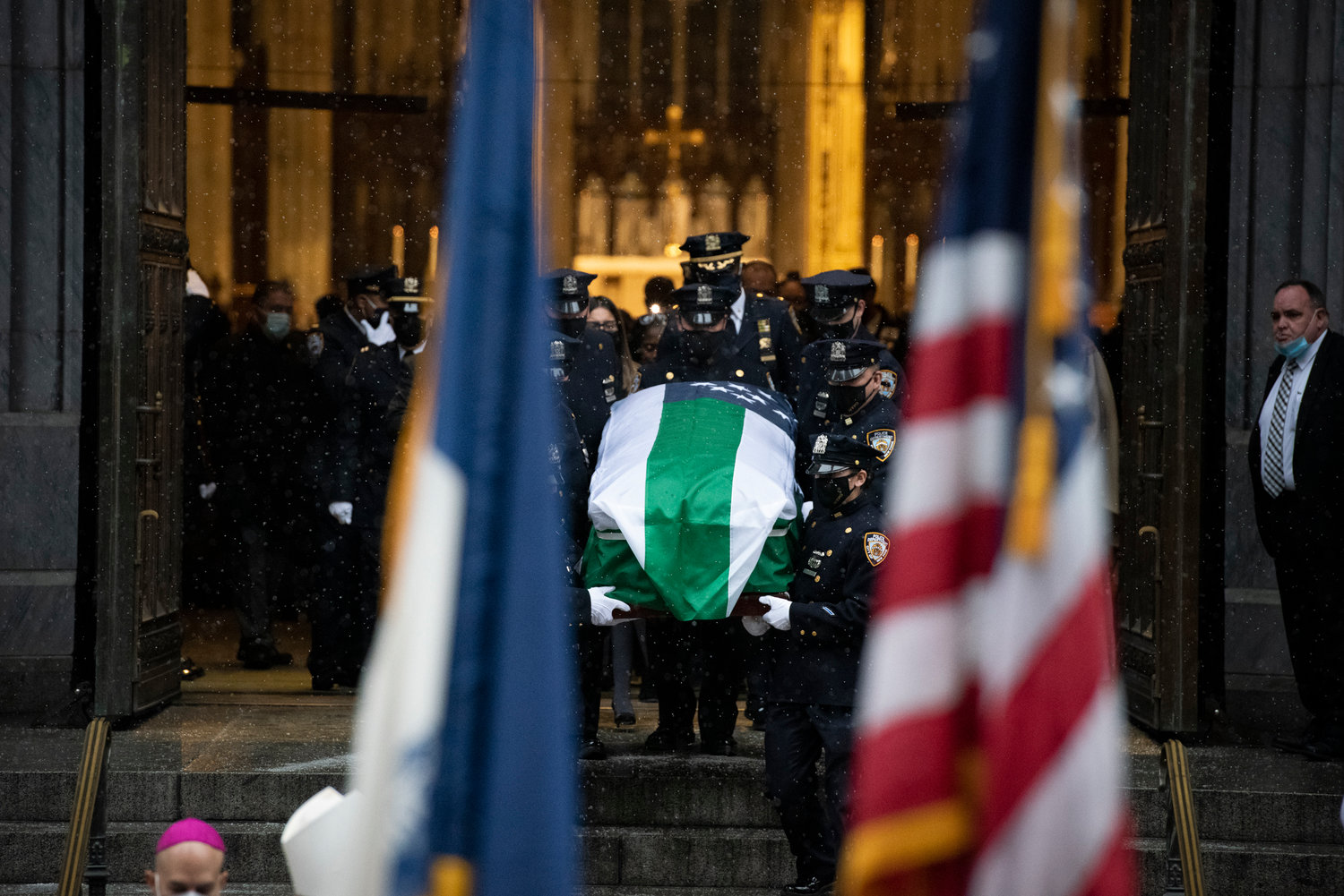 Casket is carried from St. Patrick’s Cathedral after the Funeral Mass for Det. Jason Rivera Jan. 28.