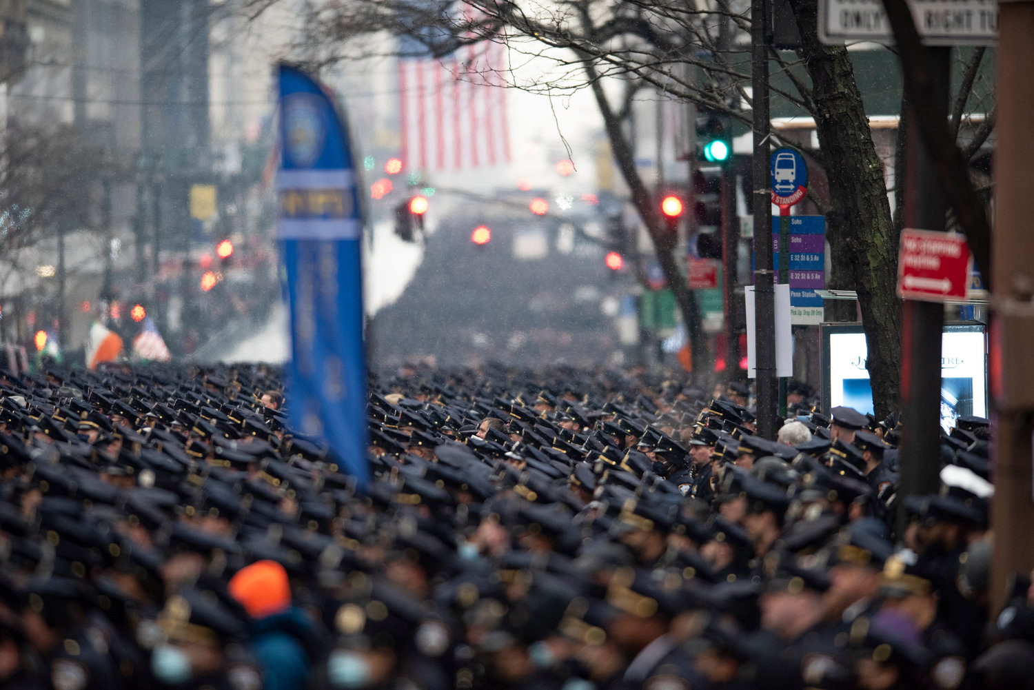 A sea of blue stretches across and down Fifth Avenue.