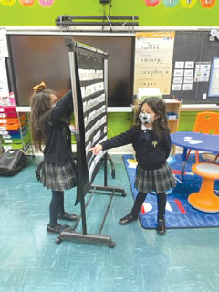Students enrolled in the Enhanced Special Education Program at St. Frances de Chantal School, the Bronx, demonstrate their devotion to their work.