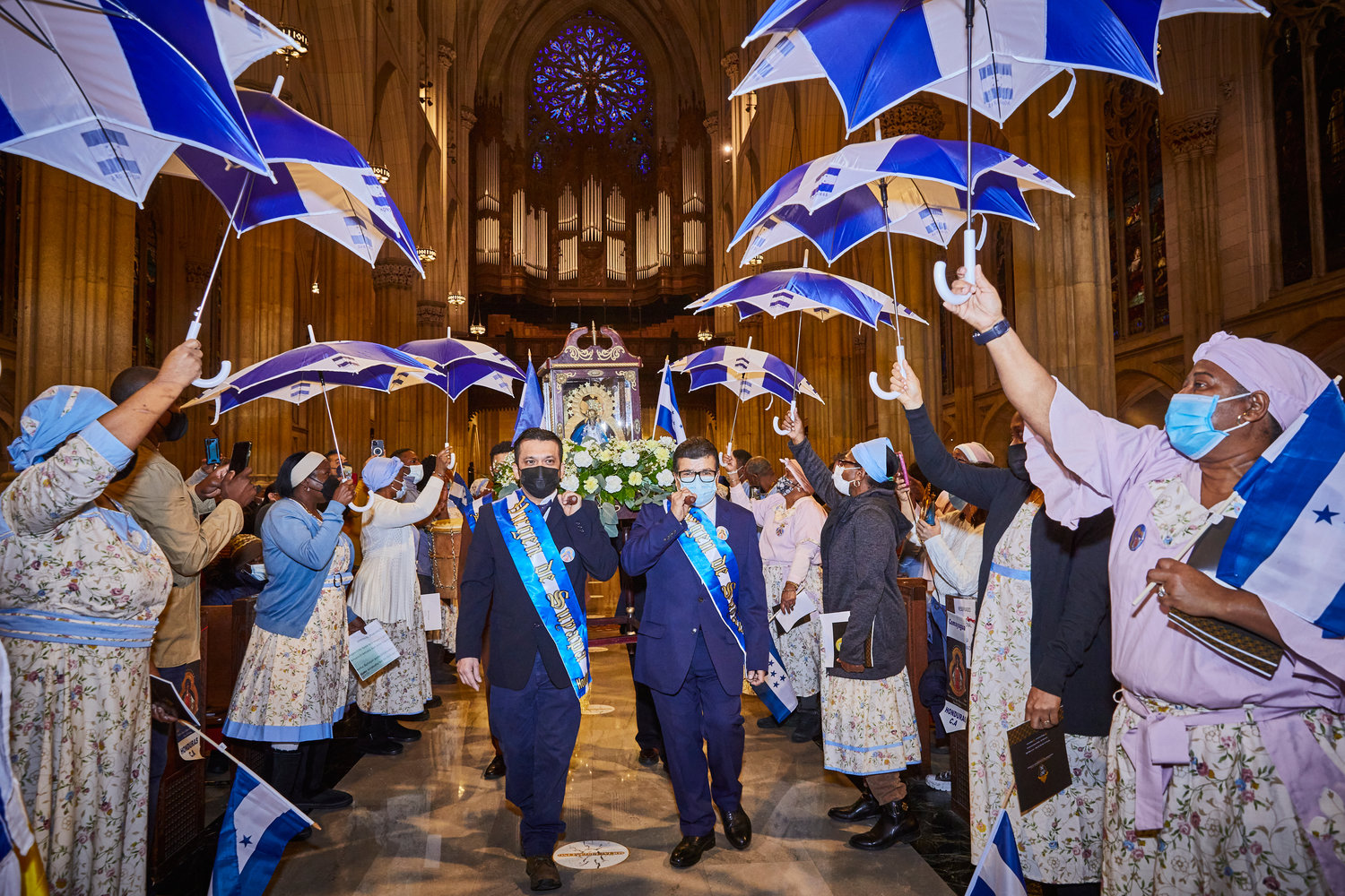 An image of Our Lady of Suyapa was featured in the entrance procession of the annual Mass honoring the patroness of Honduras Feb. 13 at St. Patrick’s Cathedral. The umbrellas held aloft symbolize the presence of the Holy Spirit among the faithful. The principal celebrant and homilist was Bishop Jose Antonio Canales Motiño of the Diocese of Danlí, Honduras.