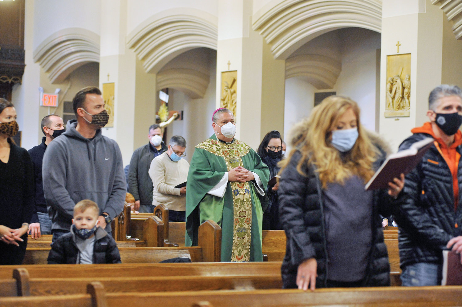 Surrounded by his congregation, then-Bishop-elect John Bonnici, pastor of St. Augustine parish and SS. John and Paul parish, Larchmont, processes into the 10:30 a.m. Sunday Mass he celebrated Feb. 6 at St. Augustine Church.