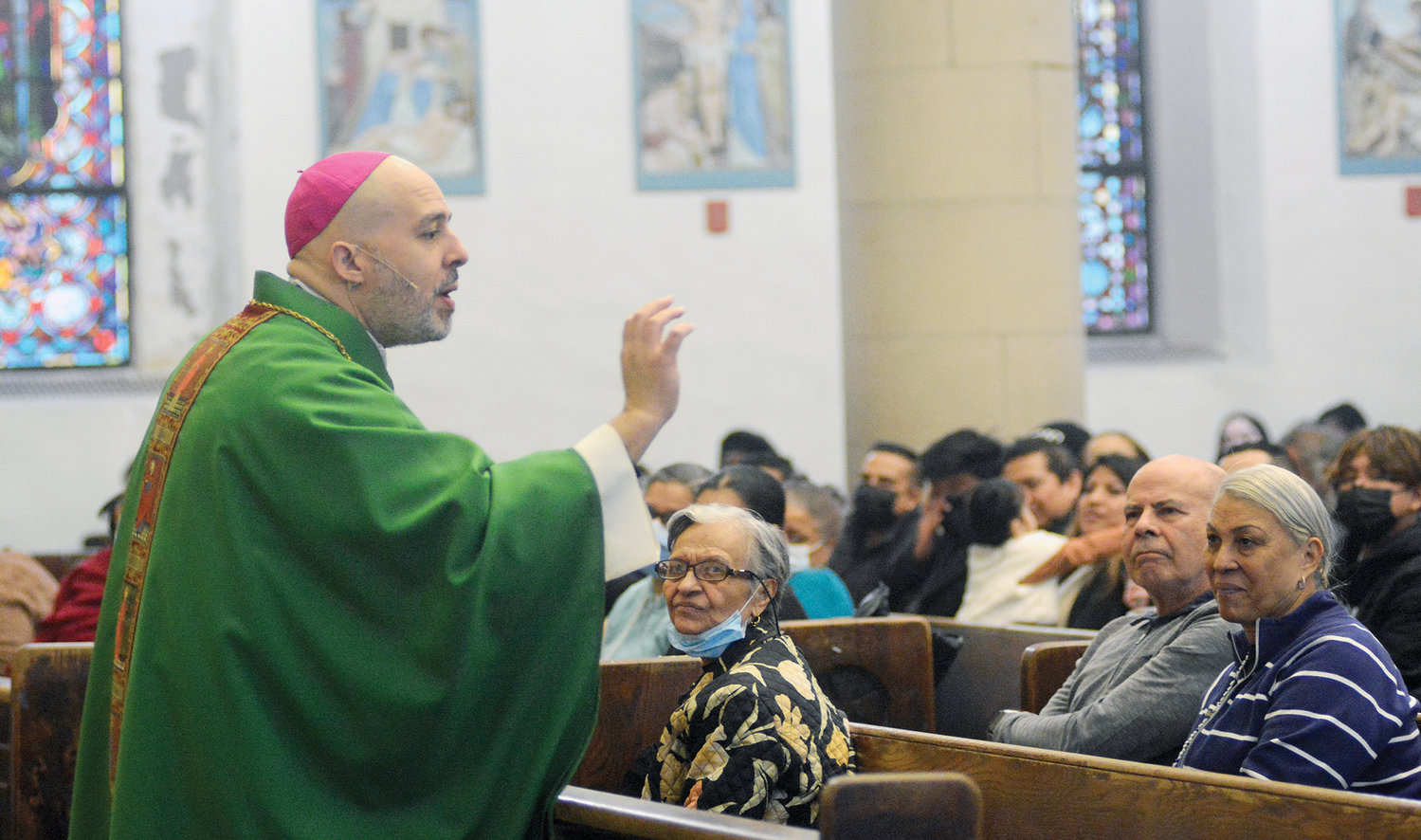 With his parents Jose and Mercedes Espaillat sitting in a front pew, then-Bishop-elect Joseph A. Espaillat delivers his homily during a Feb. 13 Mass he celebrated at St. Anthony of Padua Church in the Bronx, where he has been pastor since 2015.