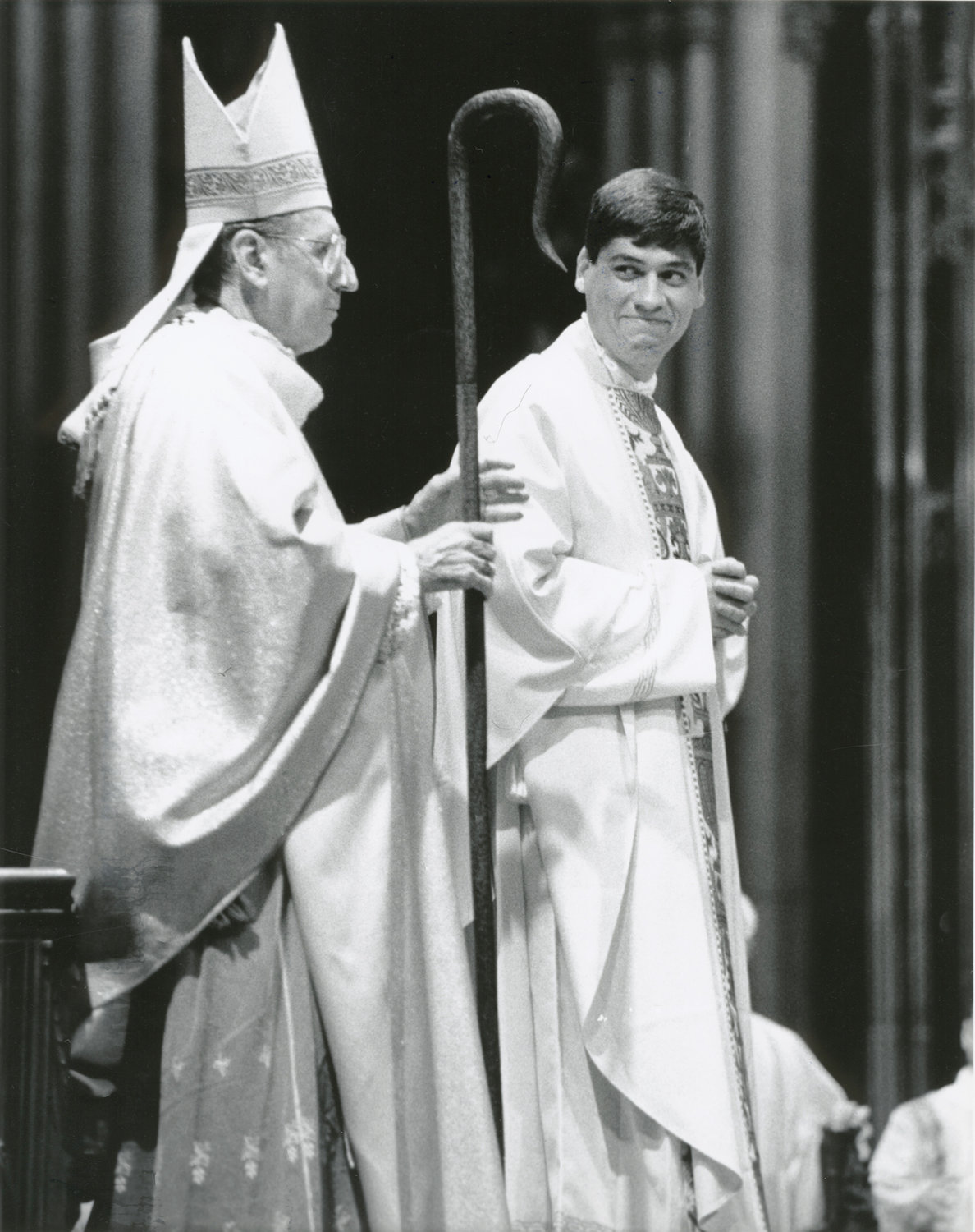 ANSWERING THE CALL—Father John Bonnici shows his gratitude as he is congratulated by Cardinal John O’Connor, who ordained him to the priesthood June 22, 1991, at St. Patrick’s Cathedral.