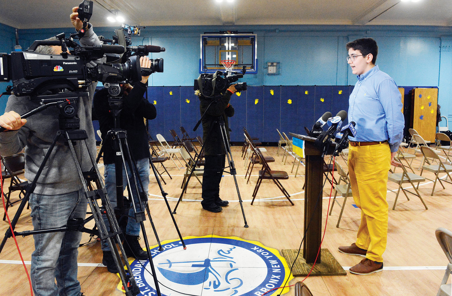Kevin Corraj, an eighth-grader at St. Brendan’s School, the Bronx, speaks with the press at the school March 28, the Day of Prayer for Ukraine.