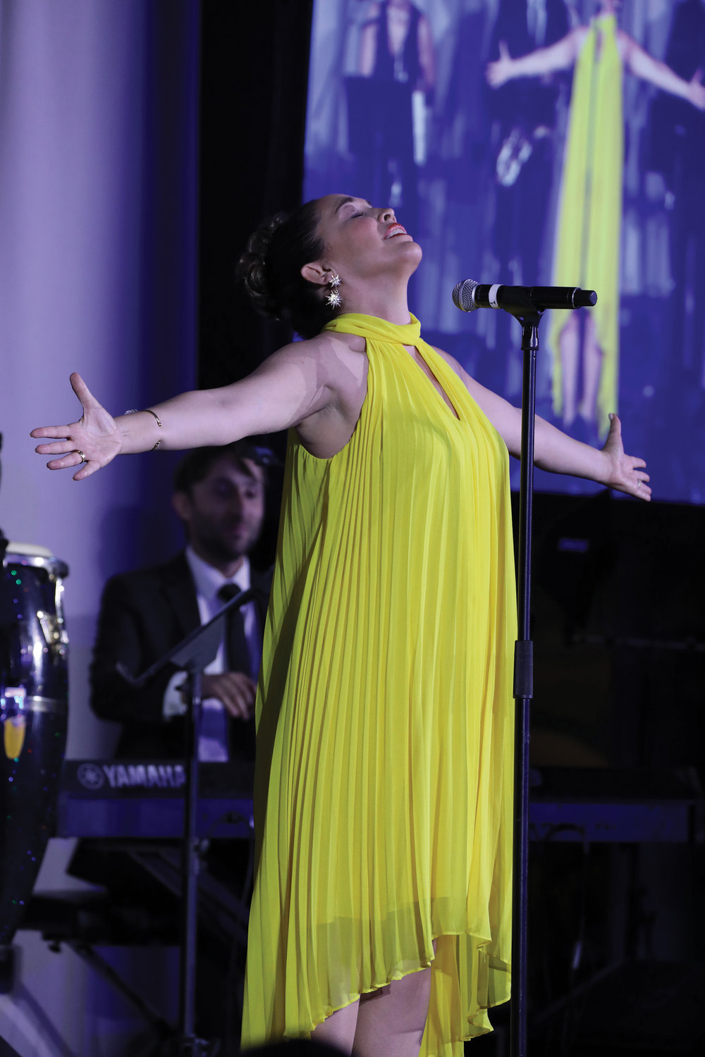 Award-winning Broadway performer Andréa Burns sang “Paciencia y Fe” from “In the Heights” and “A Place for Us” from “West Side Story.”