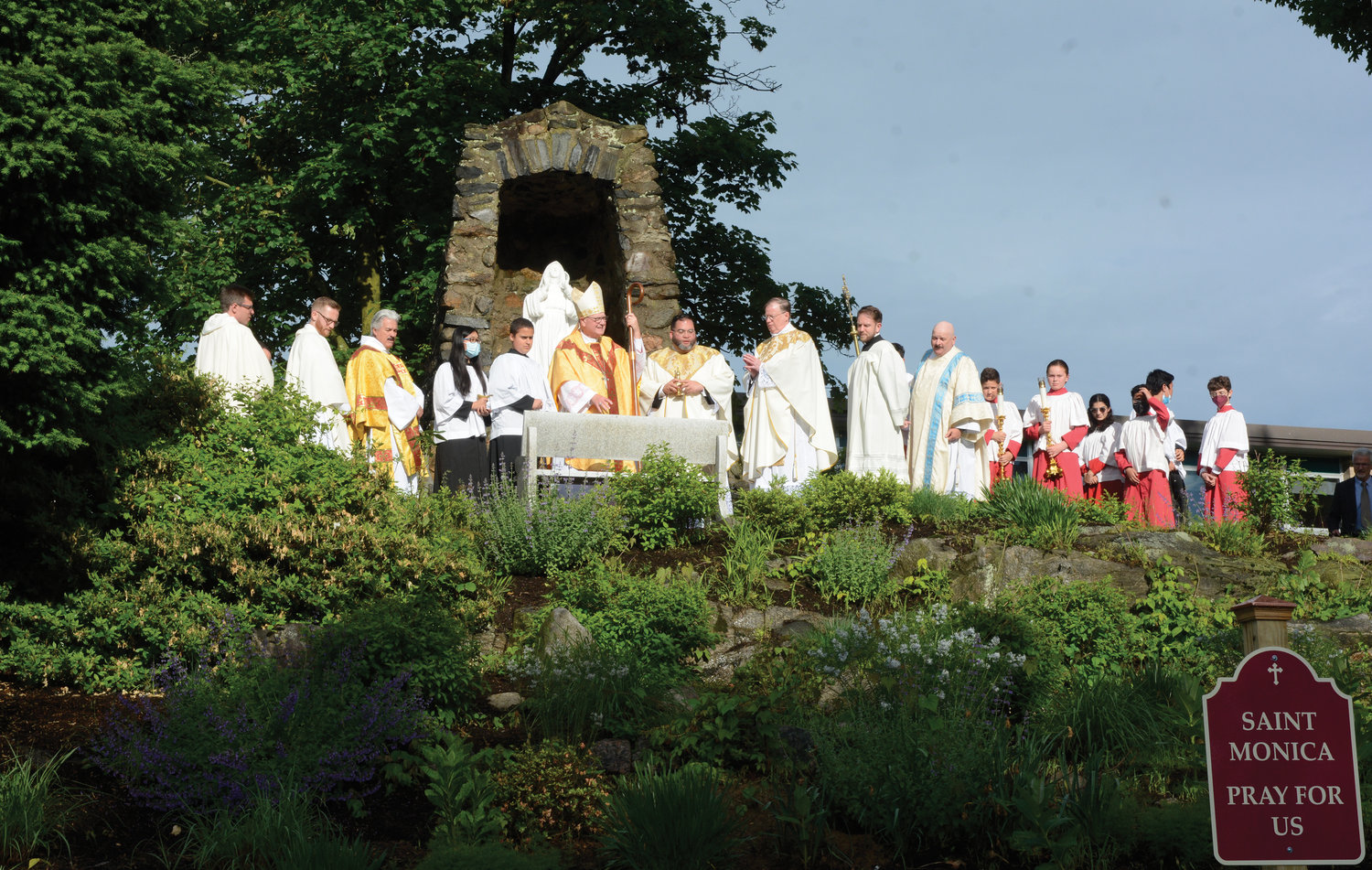 Cardinal Dolan leads the blessing of St. Monica’s Shrine outside St. Augustine Church in Ossining May 28.