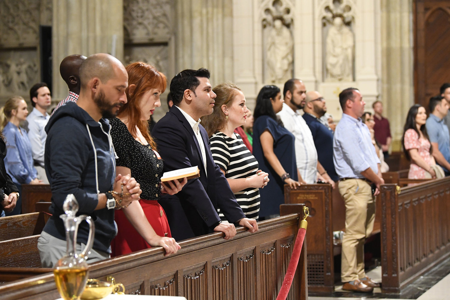 Young adults pray during the evening liturgy.