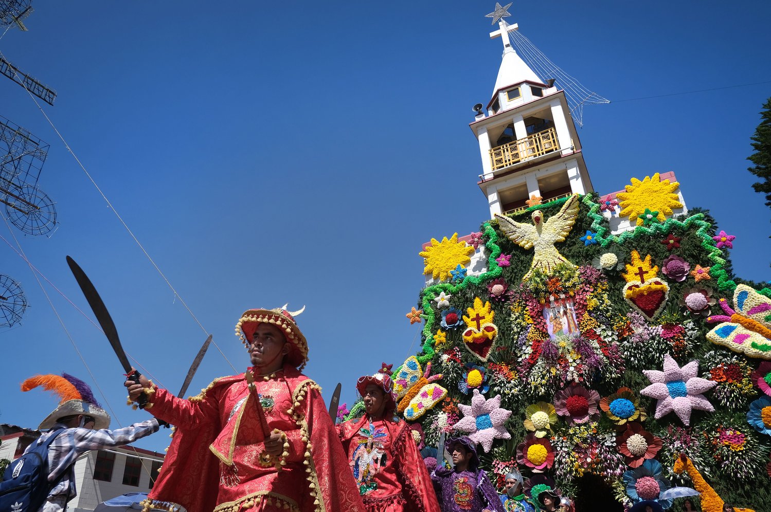 Members of a traditional dance group perform outside Santa Ana Ixtlahuatzingo Catholic Church in Tenancingo, Mexico, July 26, during a celebration on the feast of the church’s patron saint, St. Anne, grandmother of Jesus.