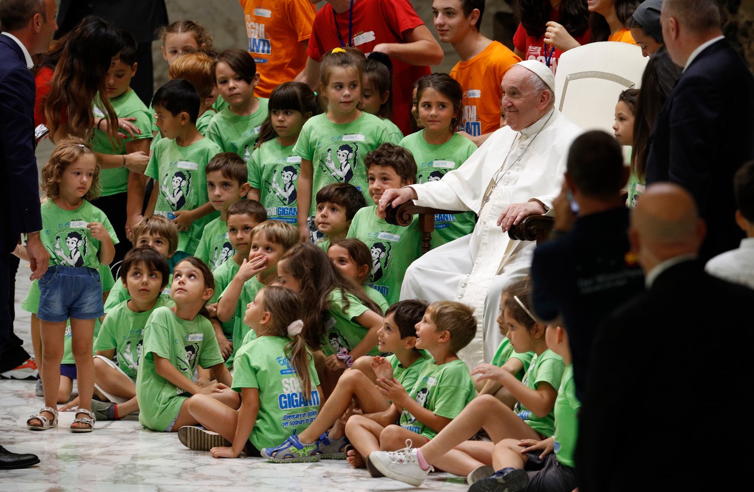Pope Francis meets children during his general audience in the Paul VI hall at the Vatican Aug. 3.