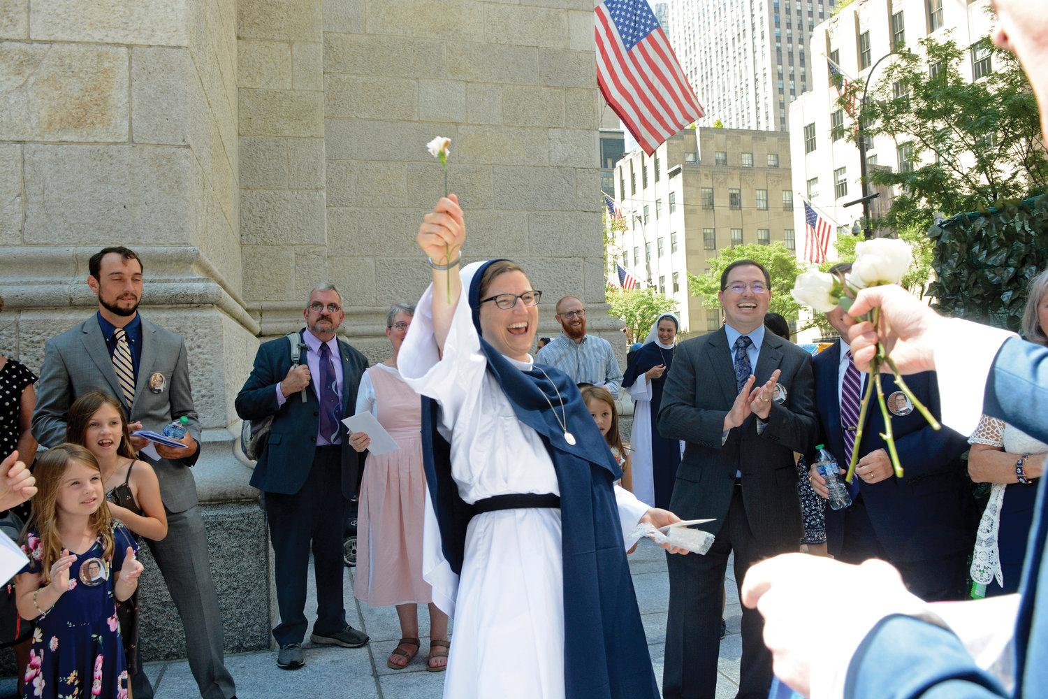Sister Gemma Grace Marie, S.V., celebrates outside St. Patrick’s Cathedral on Aug. 6 after professing final vows with the Sisters of Life during a Mass celebrated by Cardinal Dolan.