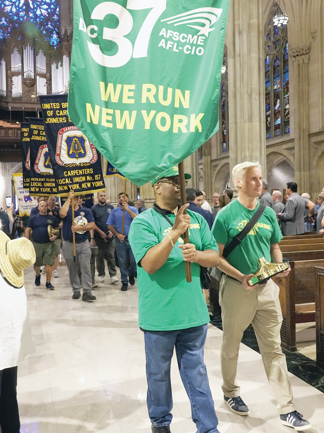 Labor unions lead the opening procession for the start of the annual Labor Day Mass at St. Patrick’s Cathedral Sept. 10.