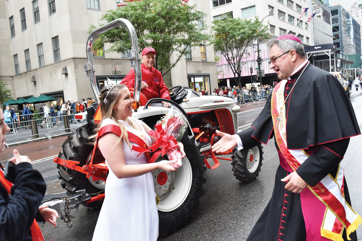 Auxiliary Bishop Witold Mroziewski of the Diocese of Brooklyn, who served as celebrant of the Pulaski Day Parade Mass at St. Patrick’s Cathedral, receives flowers.