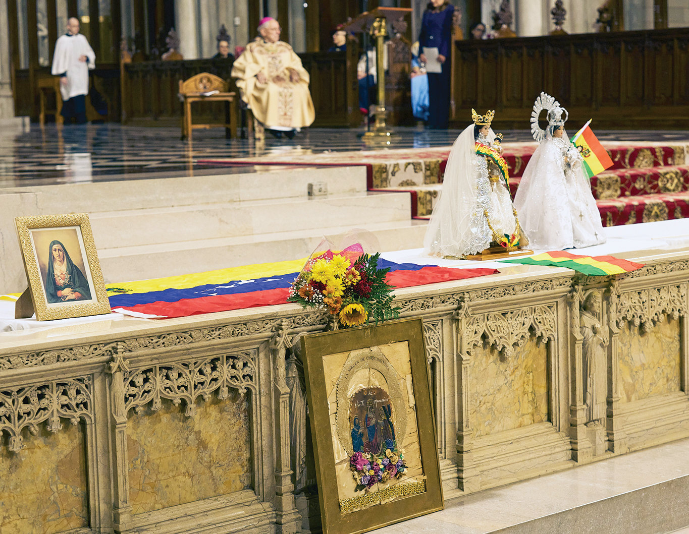 Representatives of Latin American countries and devotions to Our Lady are shown at the Spanish Mass.