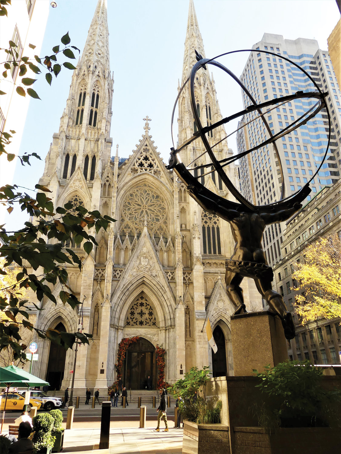 BEGINNING AND ENDING—In homage to the cover of our first issue on Sept. 27, 1981, which also featured St. Patrick’s Cathedral, we conclude our publishing journey with an image of St. Patrick’s. The photo also shows the iconic sculpture of Atlas in bronze in the foreground.
