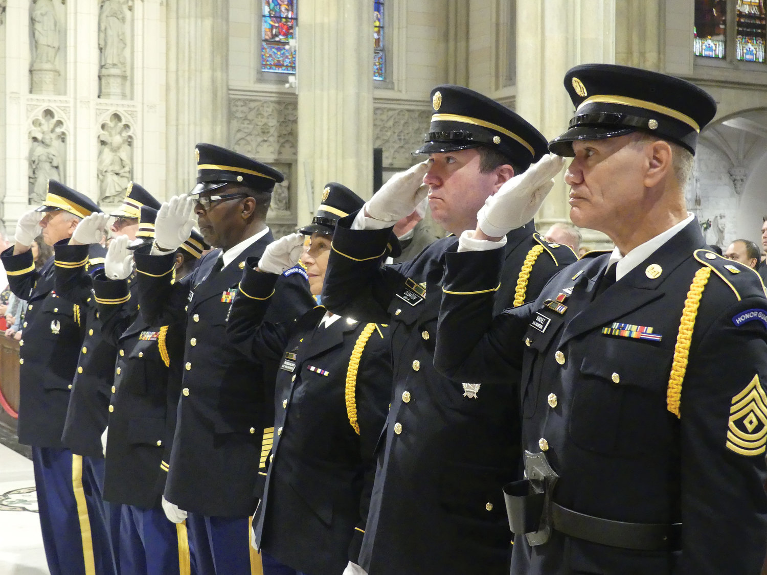 CHURCH AND COUNTRY—An honor guard salutes during the 10:15 a.m. Mass Cardinal Dolan celebrated Nov. 6 at St. Patrick’s Cathedral five days before Veterans Day.